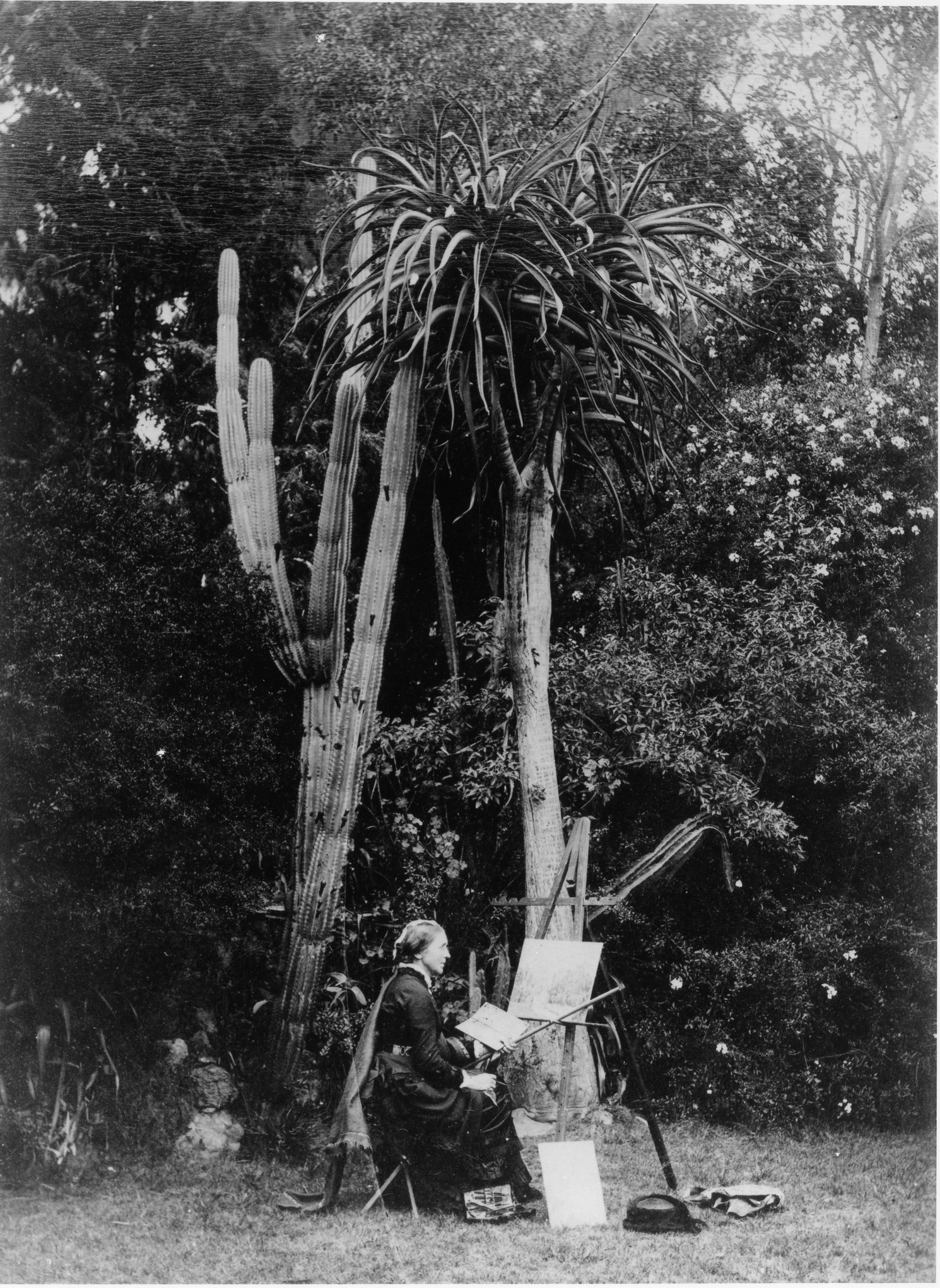 Retrato de Marianne North pintando